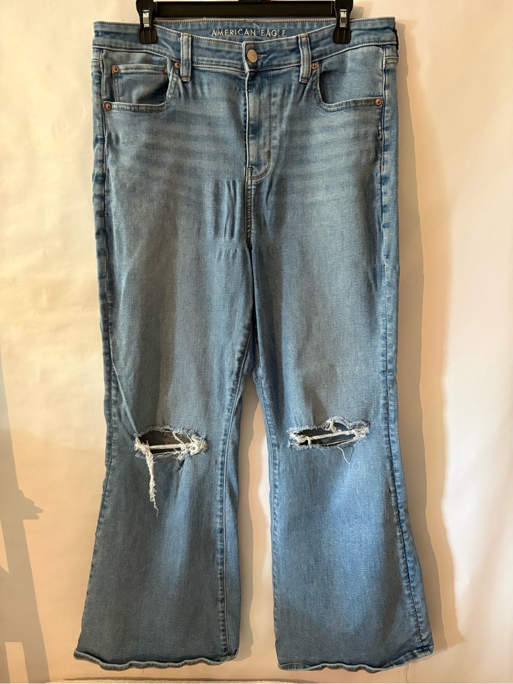 American Eagle Outfitters Light Wash Flare Jeans with Knee Rips